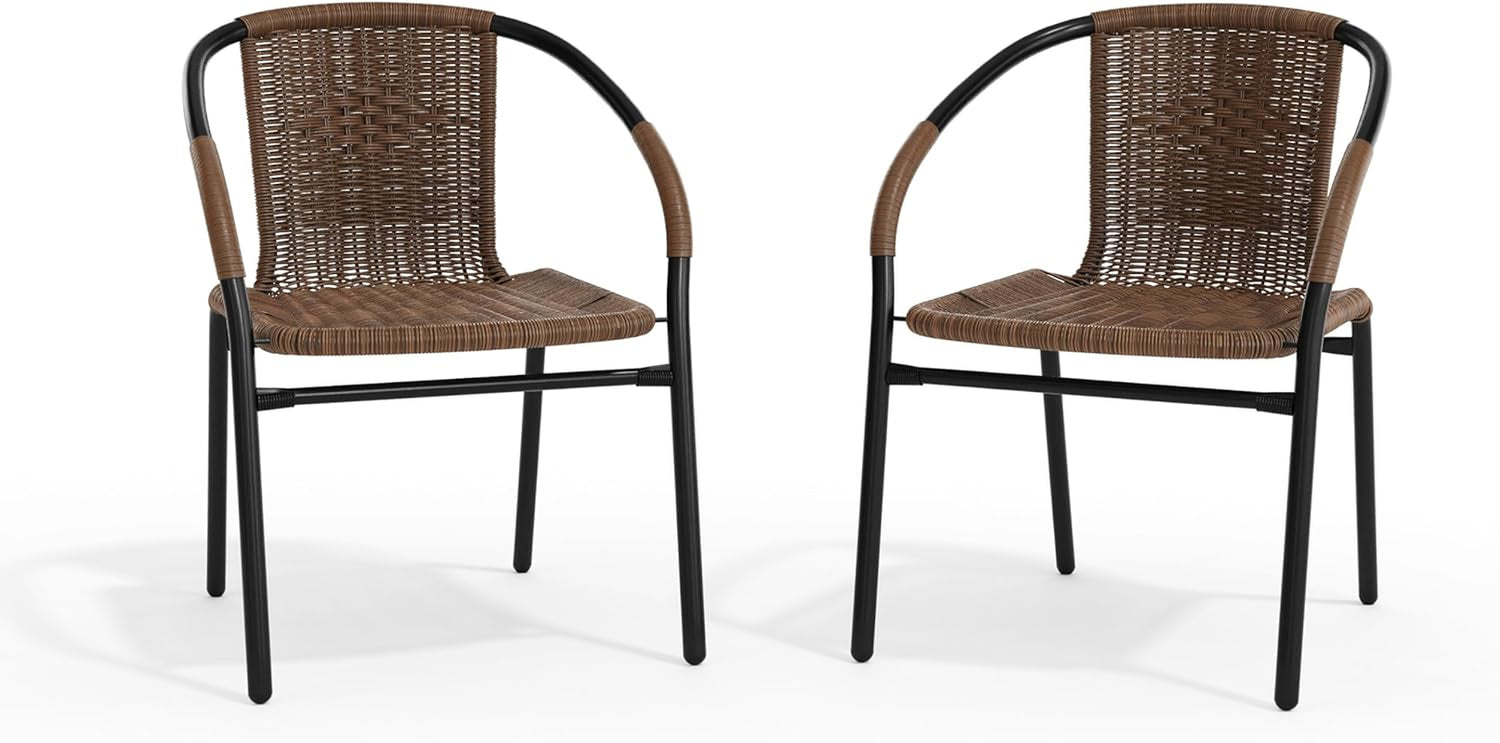 Front-facing pair of brown rattan chairs with black metal legs on a white background.