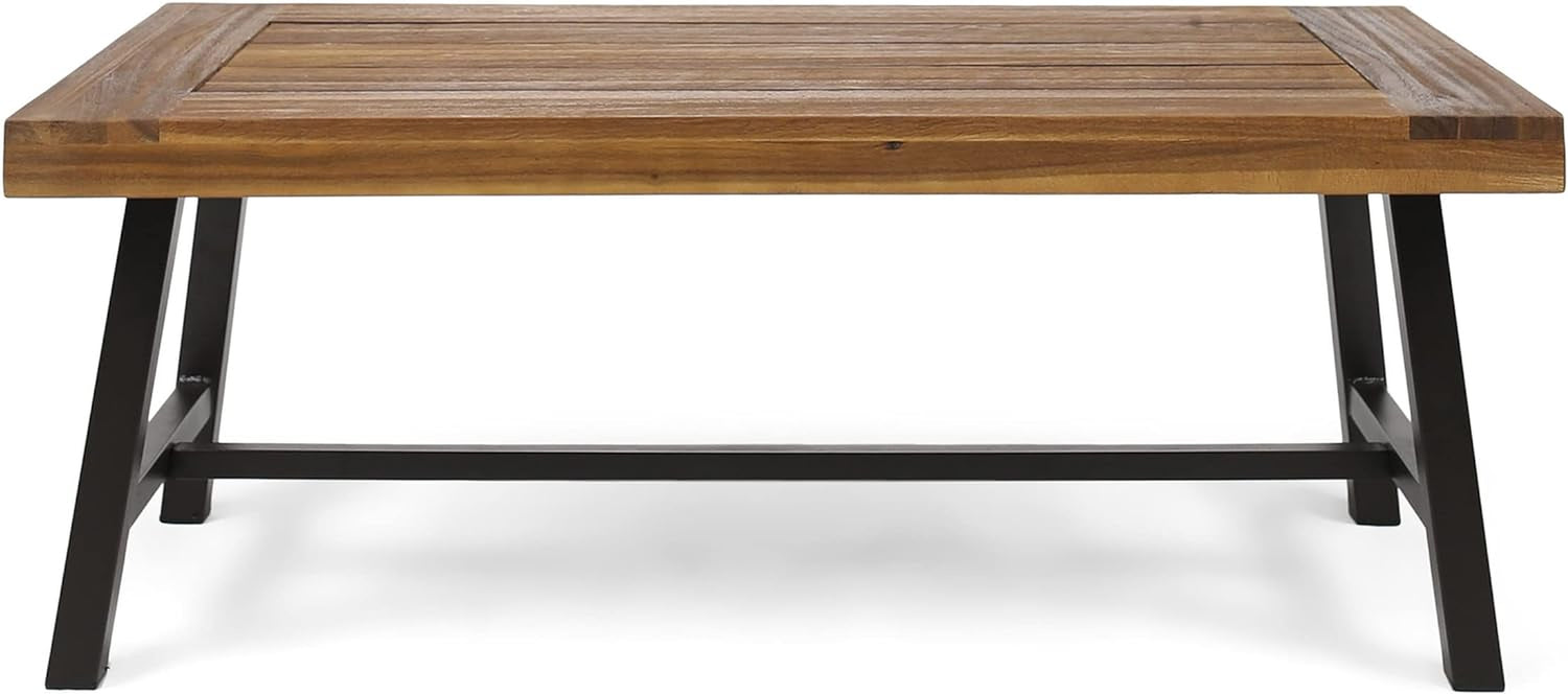 Acacia slat-top outdoor coffee table front view showing wood tabletop and black powder-coated metal base