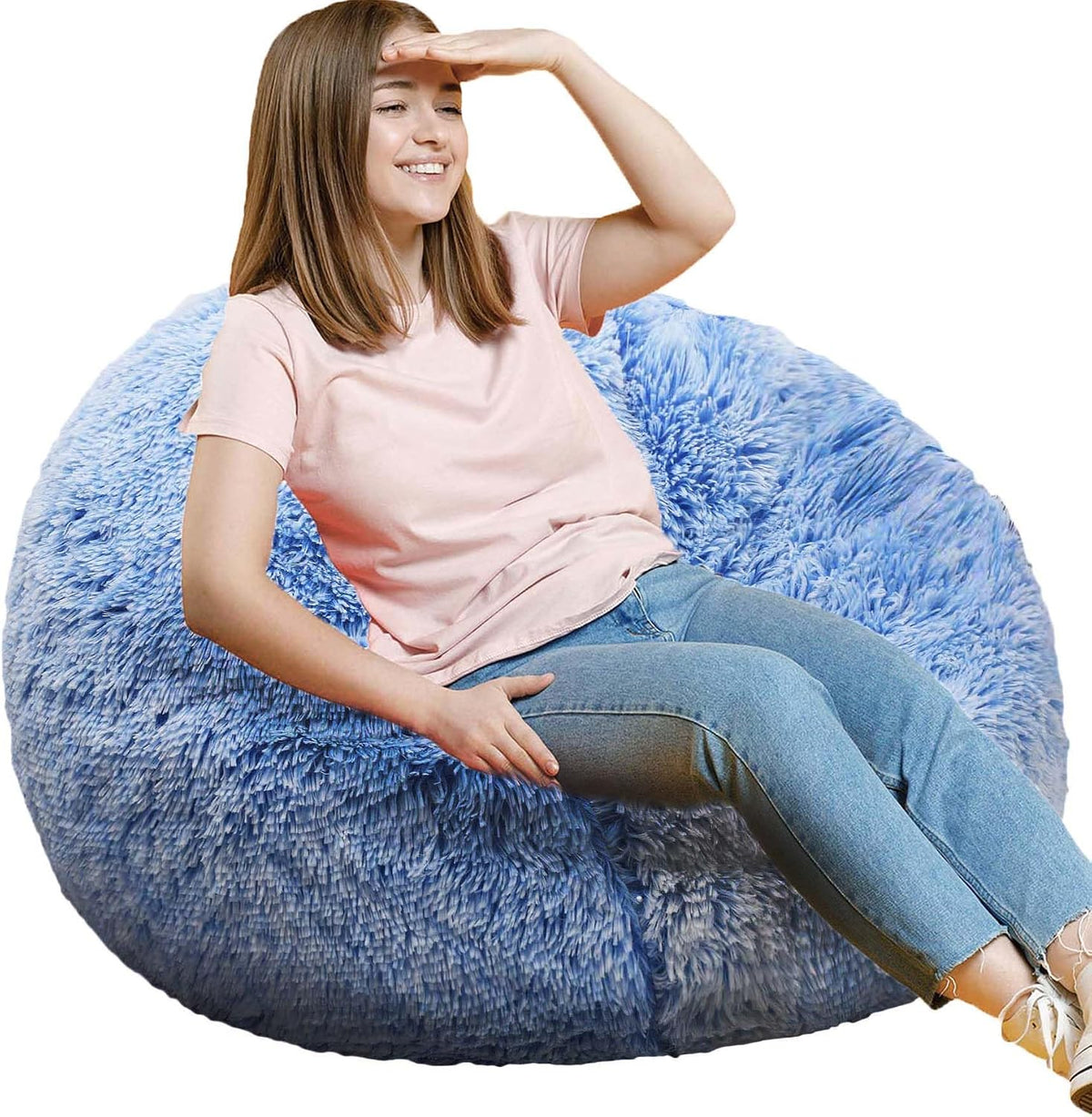 Teen girl sitting on a fluffy sky-blue round bean bag with long pile texture.