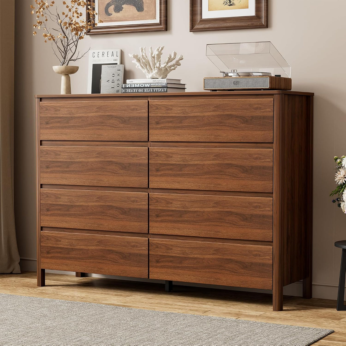 Straight-on front view of a wide walnut dresser showing six flush drawers and tapered legs