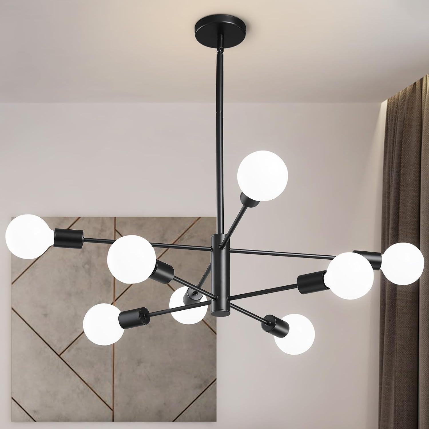 Black sputnik chandelier with white globe bulbs hanging over a living room wall and curtain.