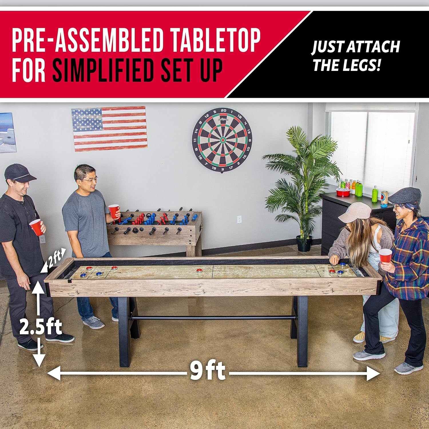 Pre-assembled tabletop with attached legs shown in a room setting, overhead angle displaying the 9 ft length and 2.5 ft table