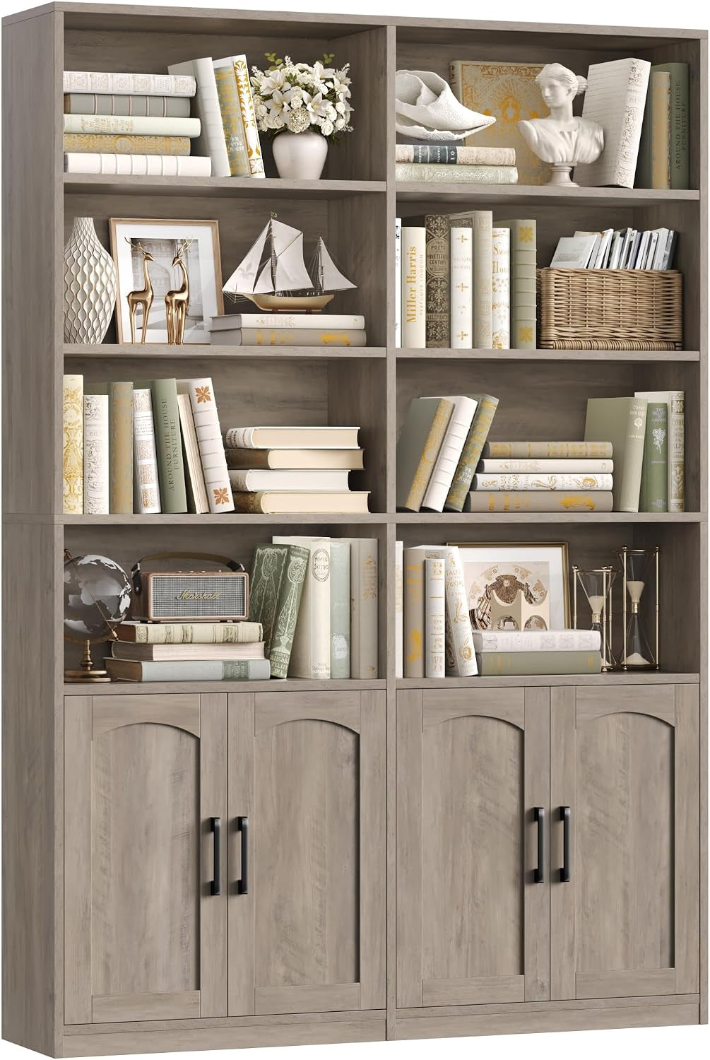 Tall light wood-grain double-wide bookshelf with four lower doors and styled books and decor