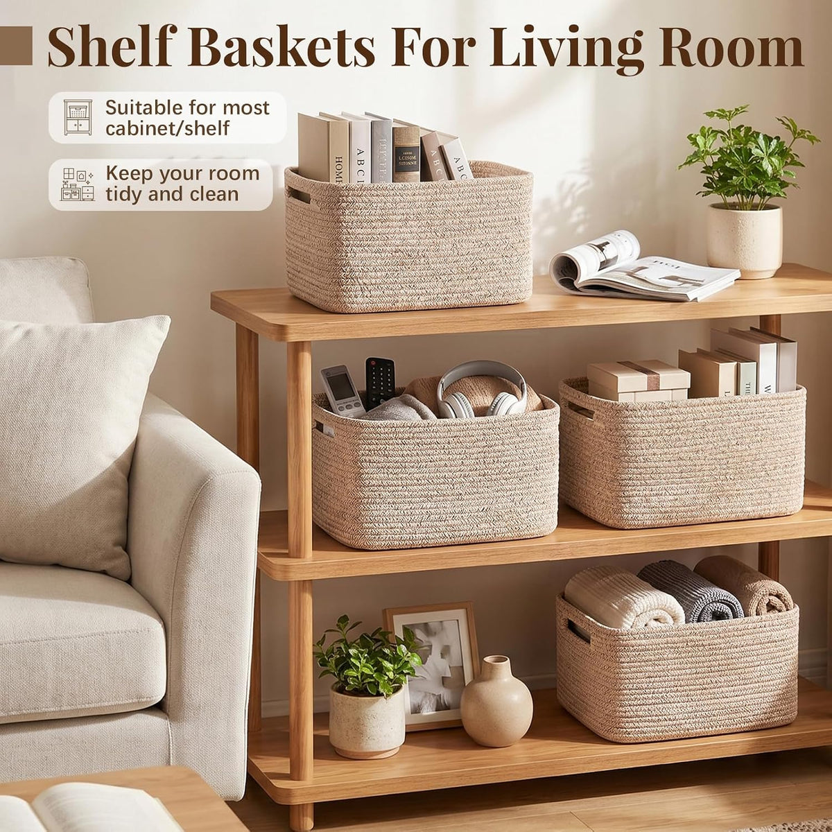 Living room console and lower shelves with beige woven baskets storing remotes, books and towels