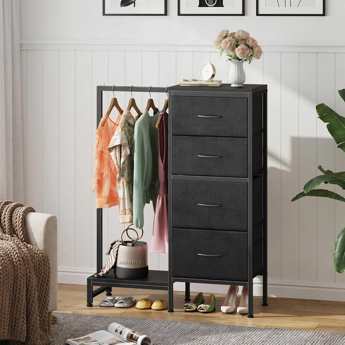 Black drawer dresser and clothes rack styled in a bedroom