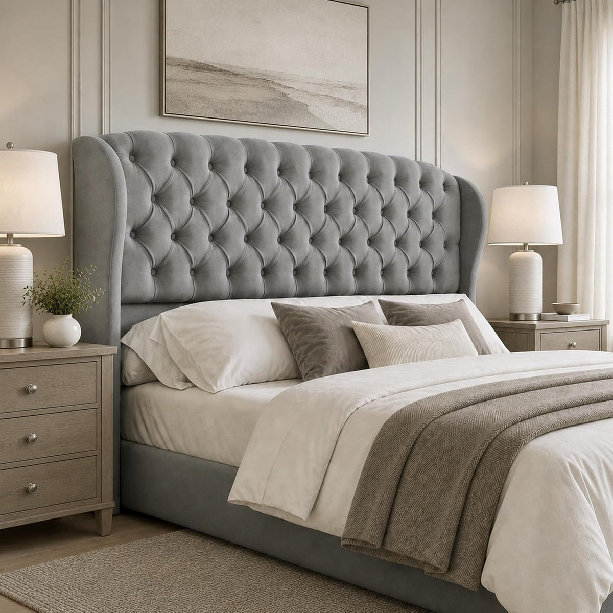 Gray velvet tufted wingback headboard, straight front view with bedside tables and lamps in a staged bedroom