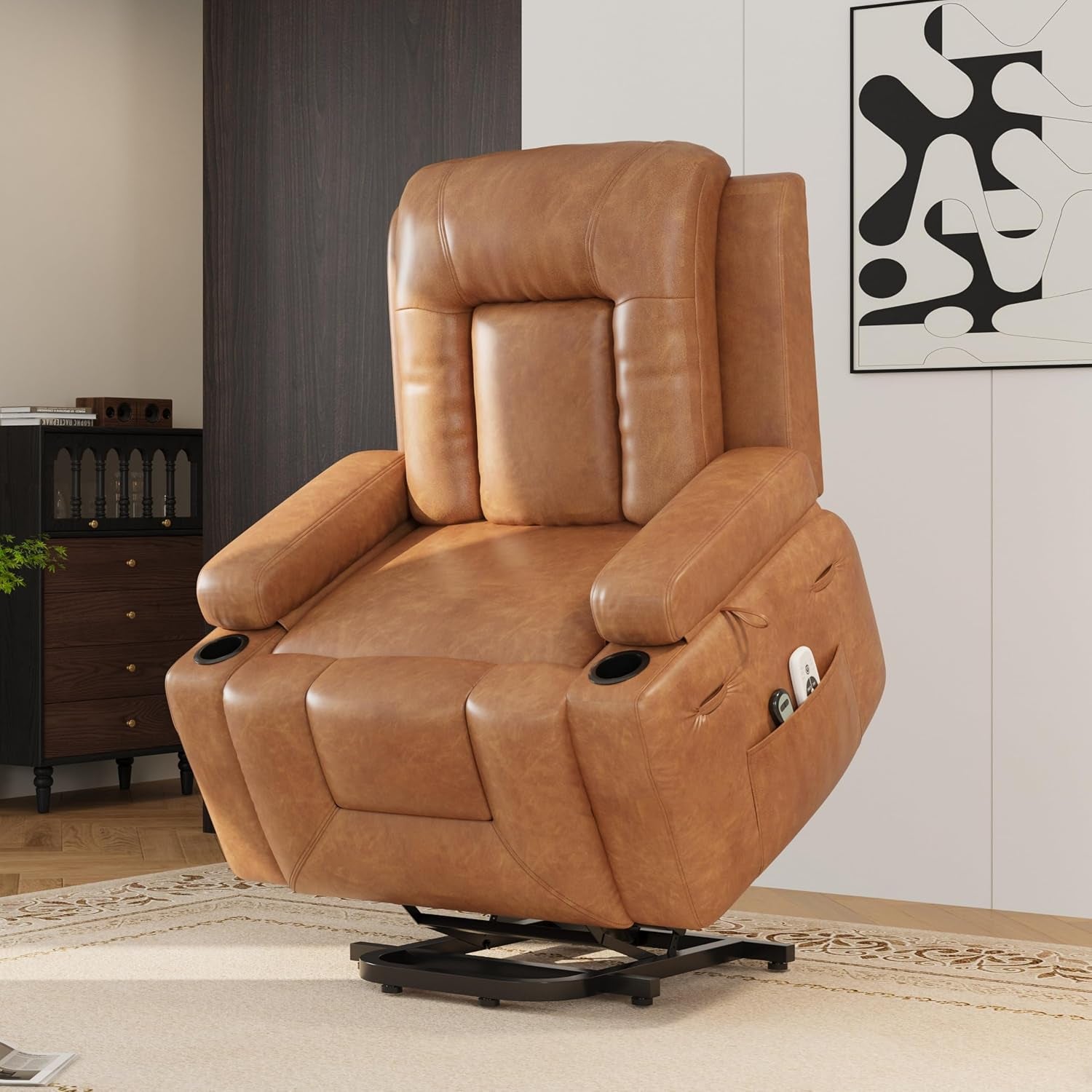 Angled front view of the cognac-colored lift recliner raised on its base in a styled room.