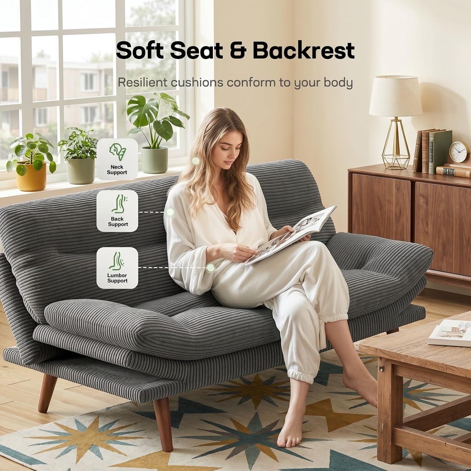 Person sitting on grey corduroy futon highlighting soft seat and backrest support