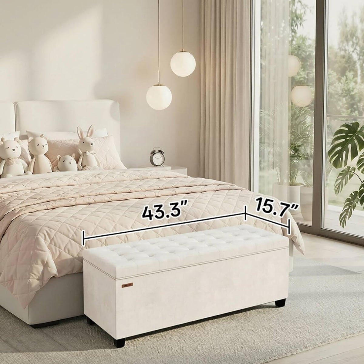 Tufted white bench placed at the foot of a bed in a bedroom scene with 43.3 x 15.7 inch dimension overlays