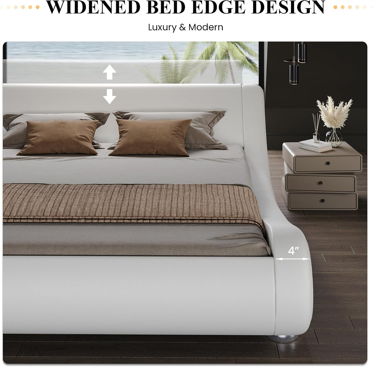 Close-up front view of a white bed frame's widened curved foot and low profile in a staged bedroom