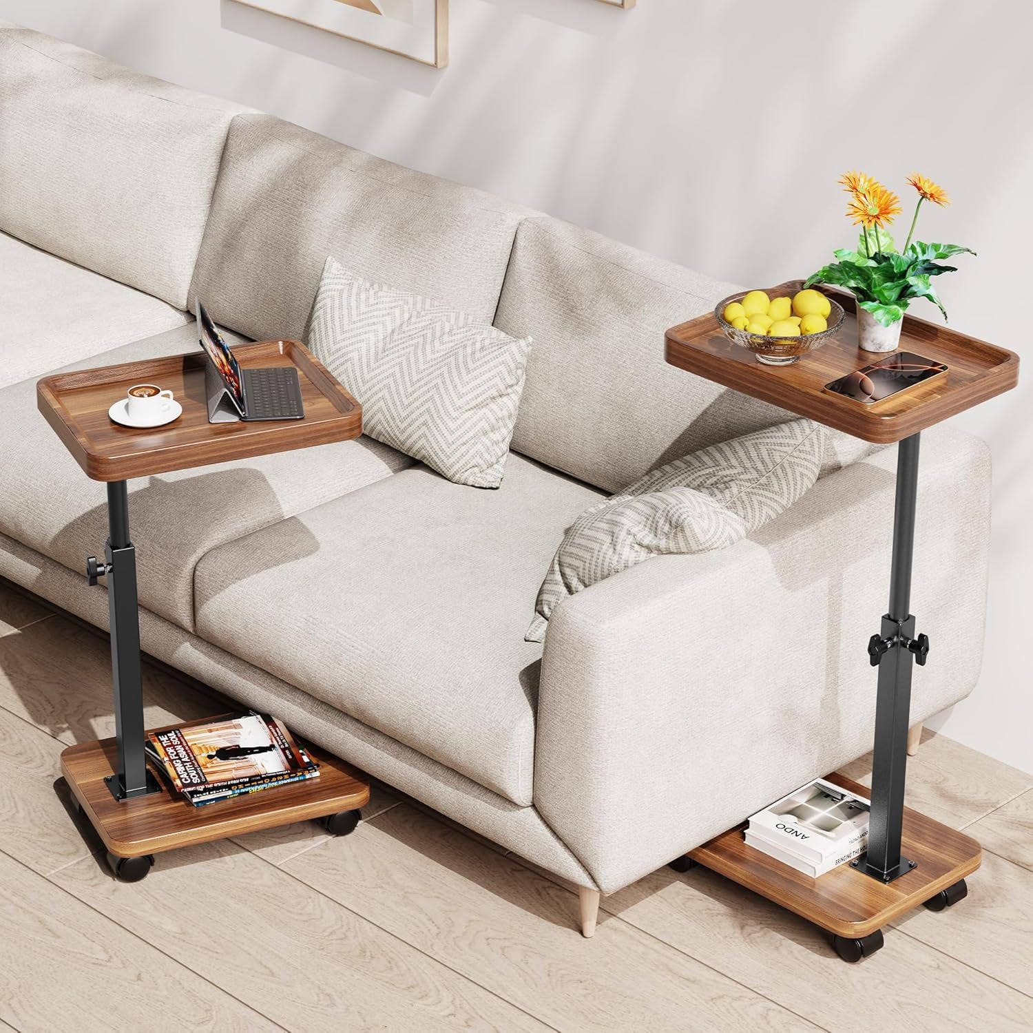 Two walnut-finish C-shaped end tables positioned along a sofa showing top and lower shelf storage usage