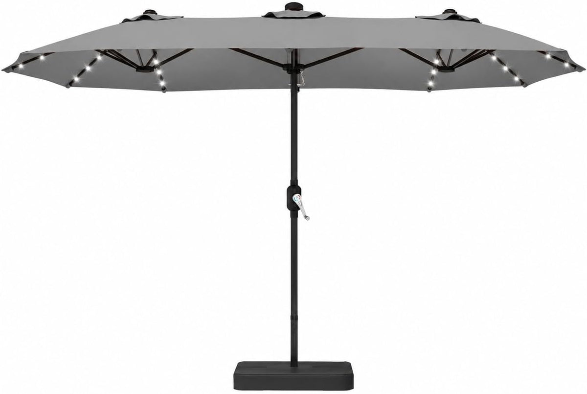 Front view of a large rectangular patio umbrella on a straight pole with a square base and LED lights along ribs.