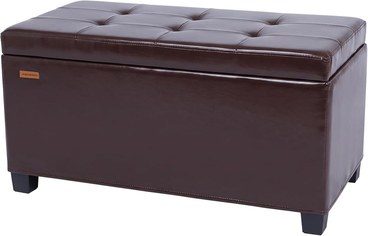Brown tufted storage bench on short black legs shown against a white background.