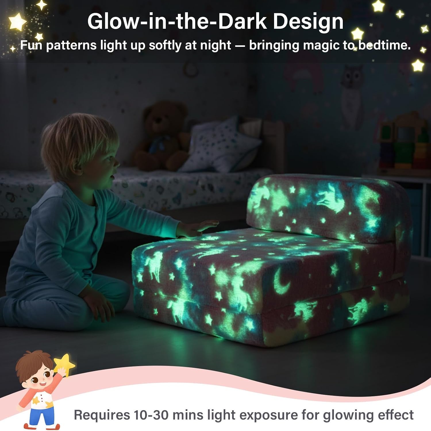 Toddler in pajamas touches a glow-in-the-dark folding sofa bed lit with stars and moon patterns in a dim bedroom.