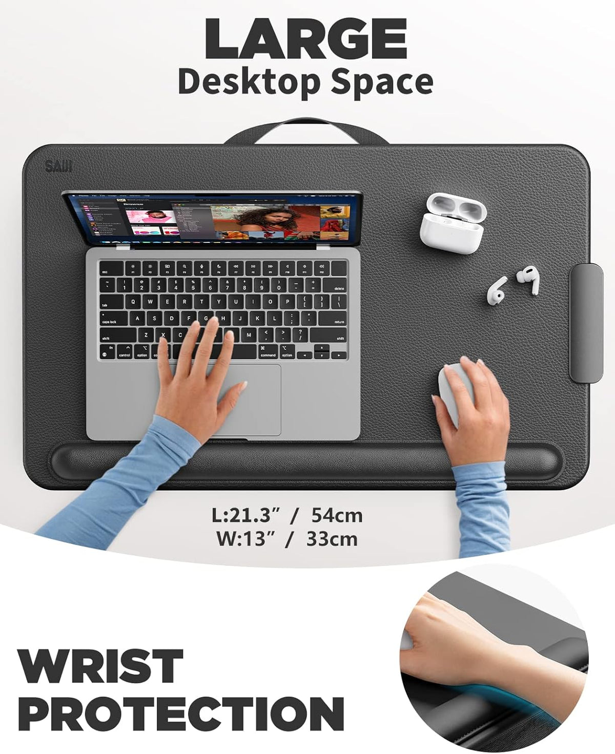 Overhead view of the lap desk in use showing hands on a laptop and mouse, wrist pad and earbud case nearby
