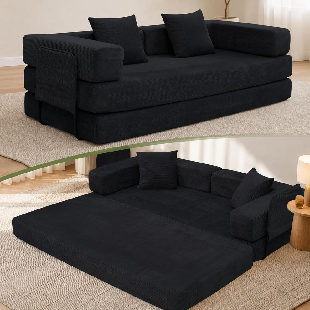 Black corduroy boneless convertible sofa arranged as a two-seater with cushions on a light rug