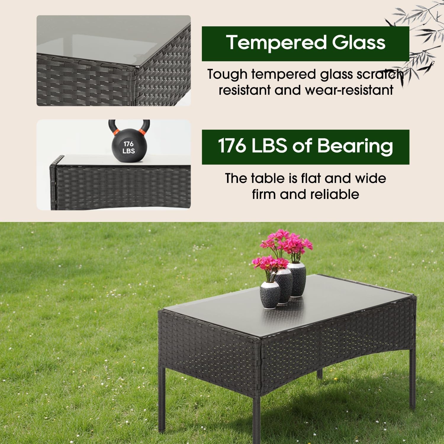 Rectangular rattan coffee table with a dark tempered glass top placed on grass, small vases on top.