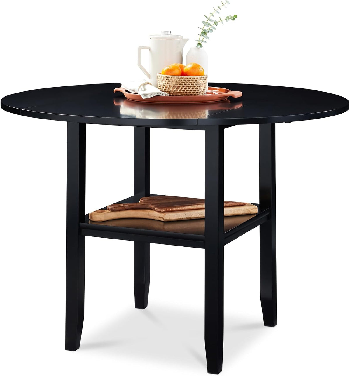Black round table on white background with lower shelf holding cutting boards and a tray with pitcher and fruit