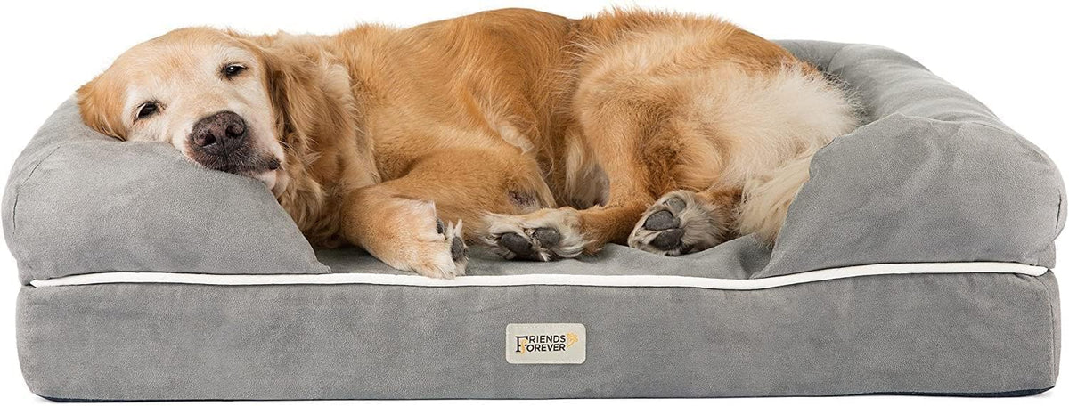 Low-front crop of the grey bolstered bed with a golden retriever resting its head on the raised side bolster