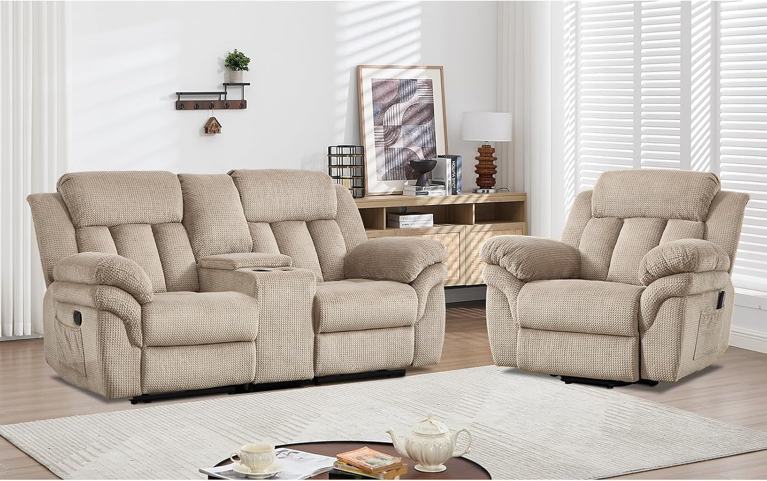 Light brown reclining loveseat with center console and matching swivel recliner in staged room