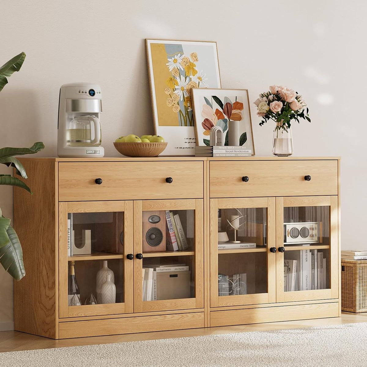 Top section detail showing two glass-front cabinets, a wide drawer above, and decor on the surface.
