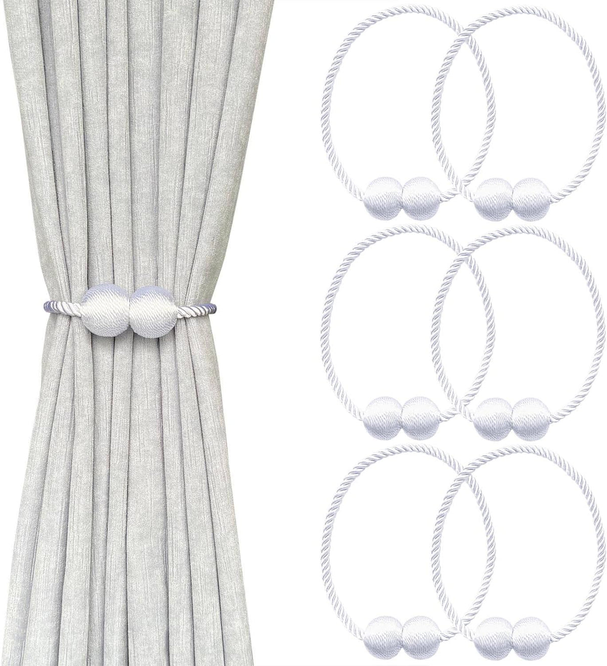 Light gray curtain gathered with a white twisted rope tieback featuring two smooth pearl-like balls