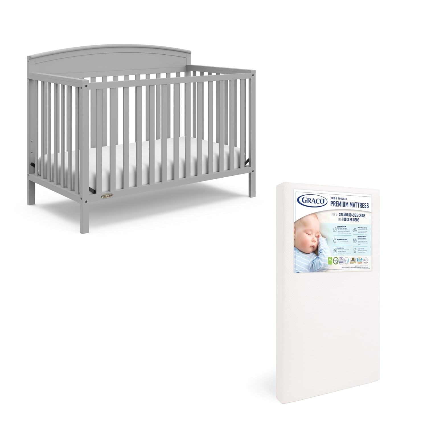 Light gray crib shown with a white packaged crib mattress standing beside it.