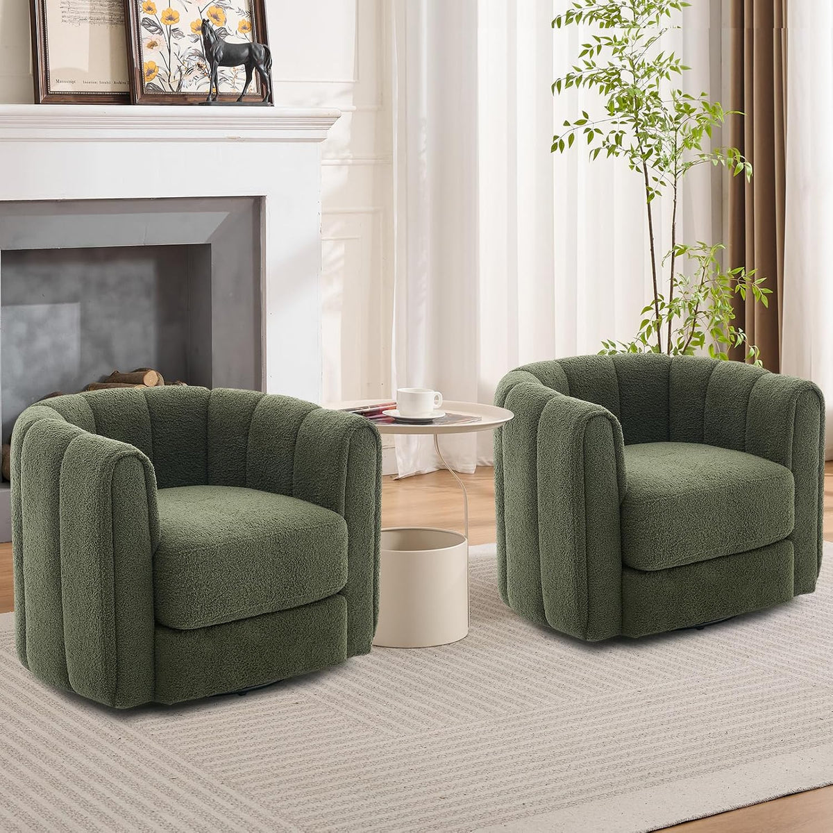 Pair of green Teddy Fleece swivel chairs staged in a living room with fireplace and rug