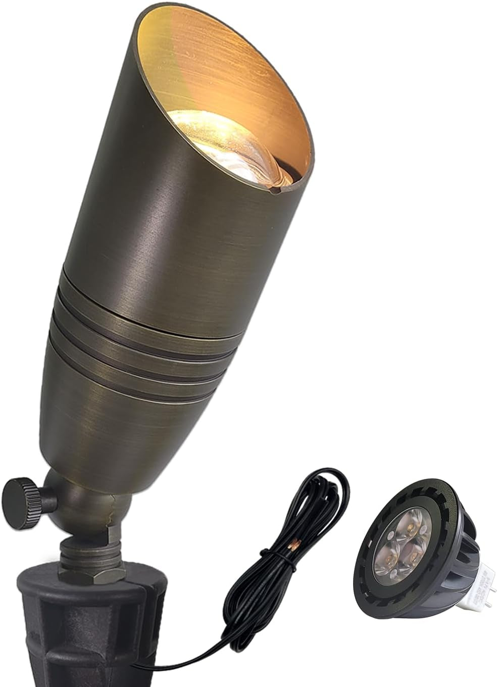 Vertical view of a bronze landscape spotlight on stake base, showing coiled cable and a separate MR16 bulb at lower right.