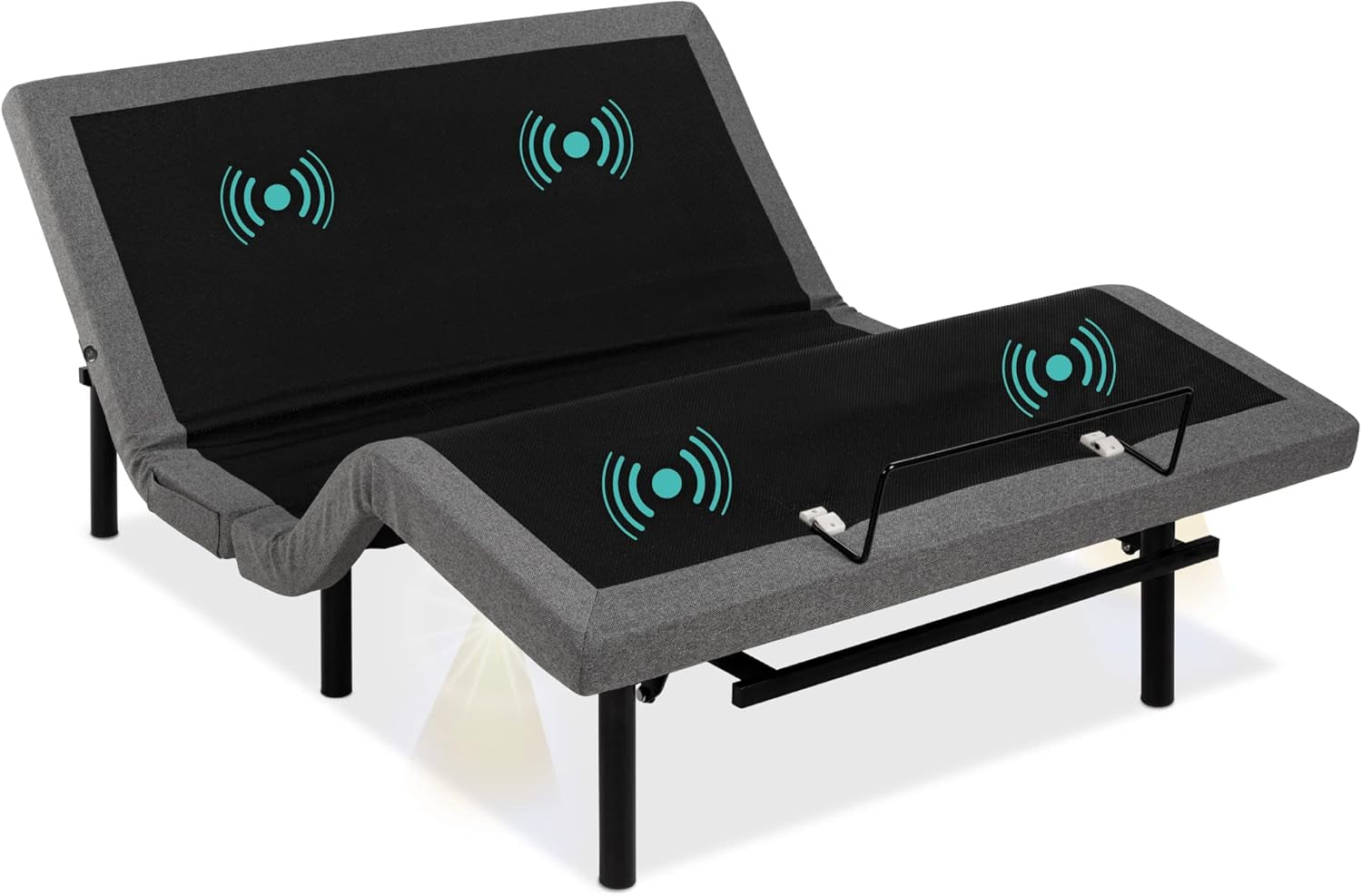 Angled view of the split king adjustable base showing both raised halves, gray upholstered frame and black support legs.