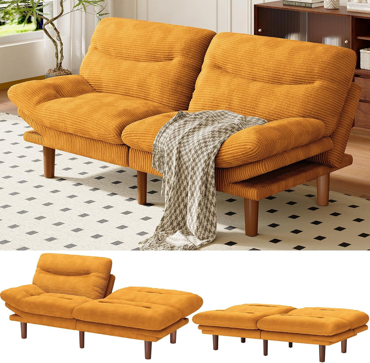 Two-seat mustard corduroy futon sofa in a living room with a throw draped over the seat