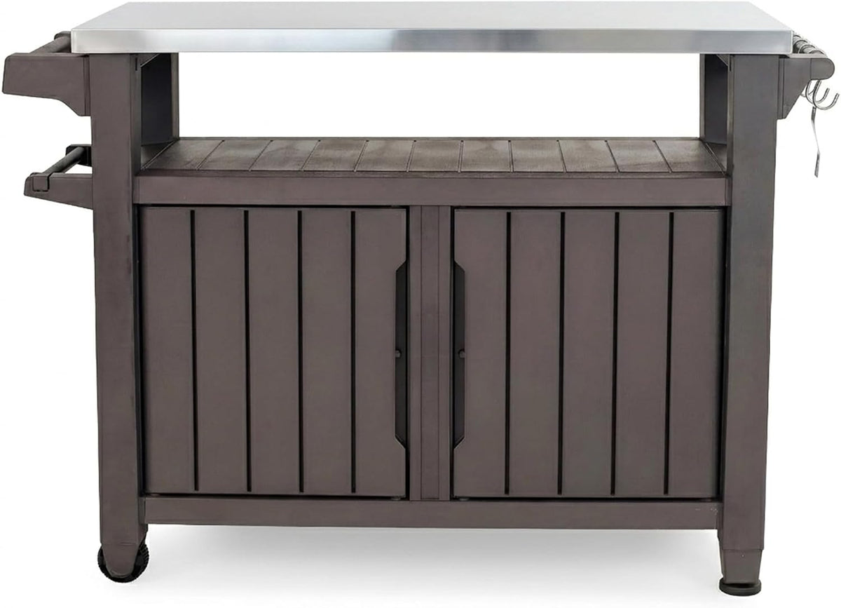Front view of a dark wood-look outdoor storage cart with a stainless top, double doors and a small caster at left.