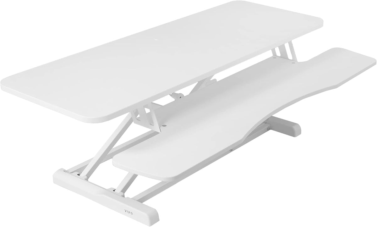 Angled view of the desk converter in white showing both tiers, frame and base.