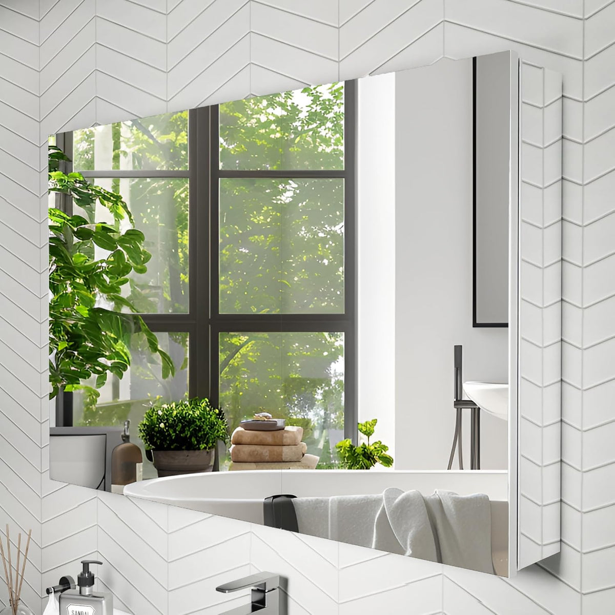 Frameless mirrored medicine cabinet installed above a bathtub showing angled front and window reflection