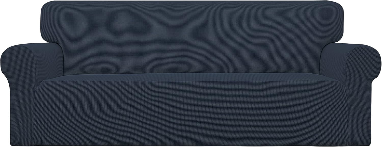 Front-facing deep blue slipcover with subtle shadowing across the backrest and a smooth, tucked lower edge.