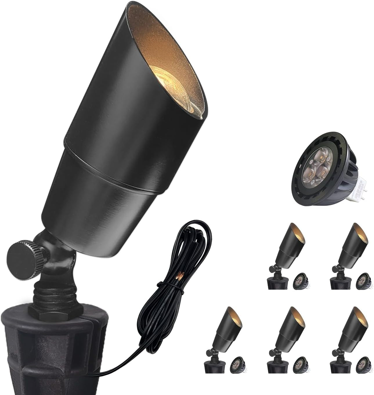 Black outdoor spotlight on a spike with cord and a small MR16 bulb shown at top right.