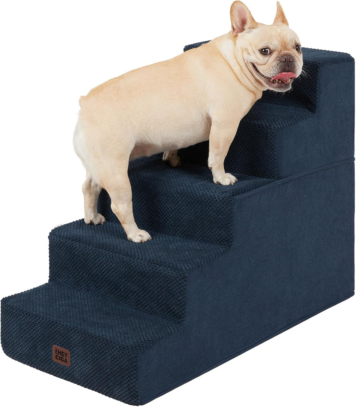 Navy blue four-step foam pet stairs with a small fawn French bulldog standing near the top step