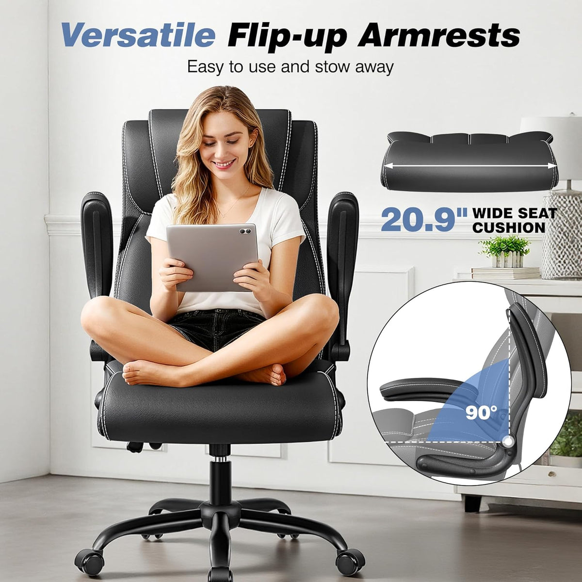 Black office chair with flip-up armrests shown in use by a person sitting cross-legged, front view
