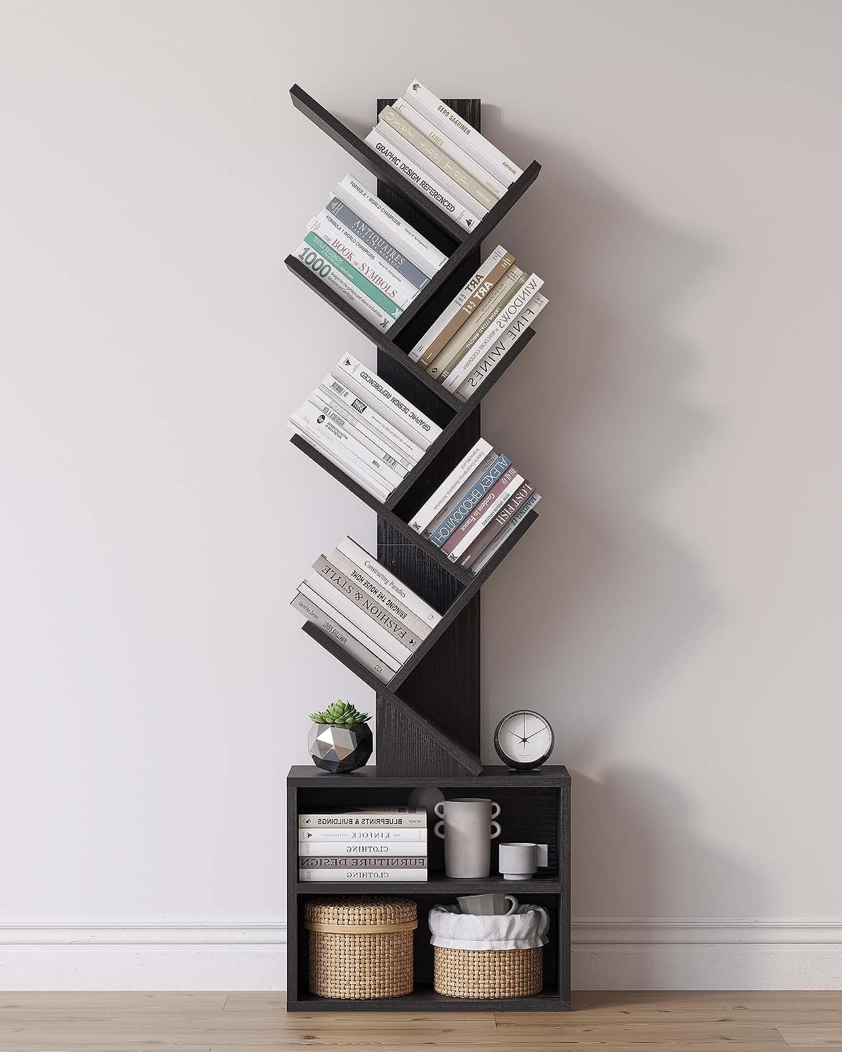 Dark wood zigzag bookshelf mounted above a matching cube cabinet with books and baskets