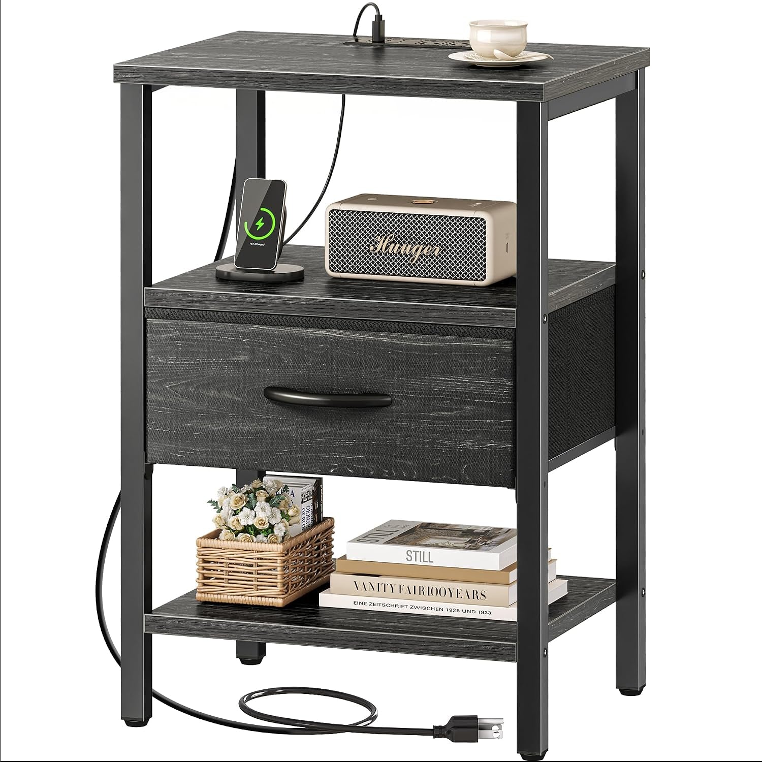 Three-tier gray nightstand with metal frame, fabric drawer, open shelves, charging station on top.