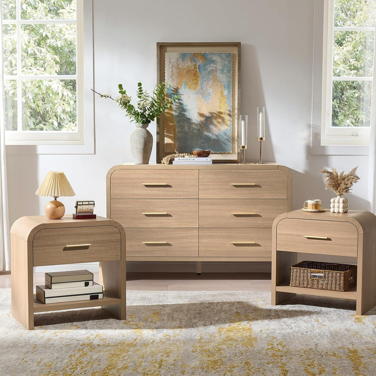 Curved wood-grain 6-drawer dresser centered with two matching nightstands in a bright room setting