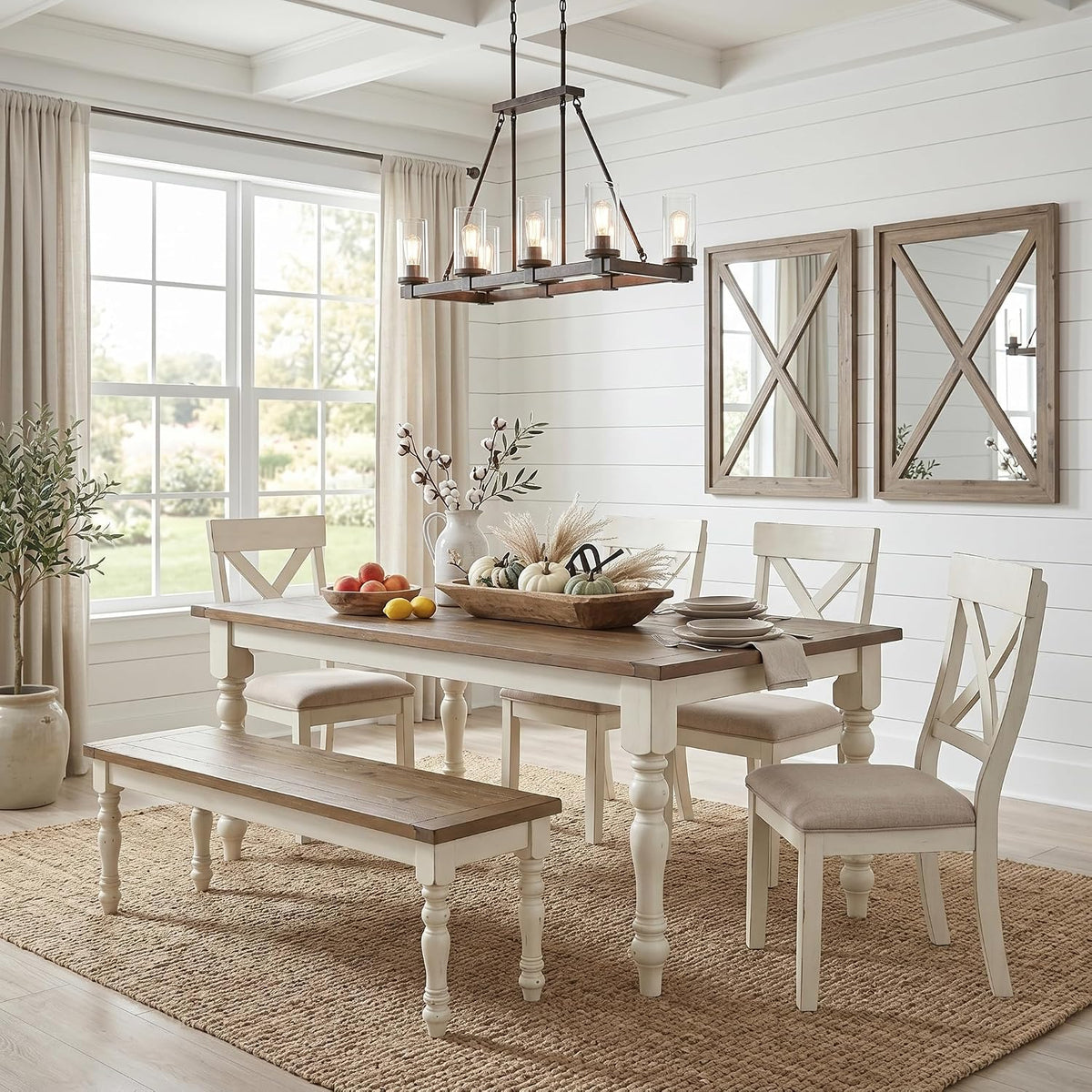 Farmhouse 6-piece dining set in antique white frames with a distressed oak tabletop shown in a bright dining room
