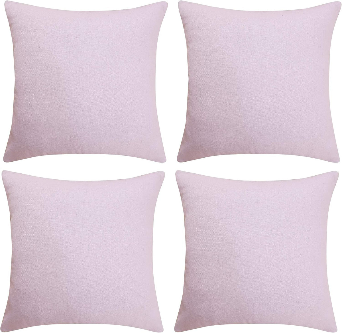 Four light pink square pillow covers arranged in a two-by-two grid on a white background