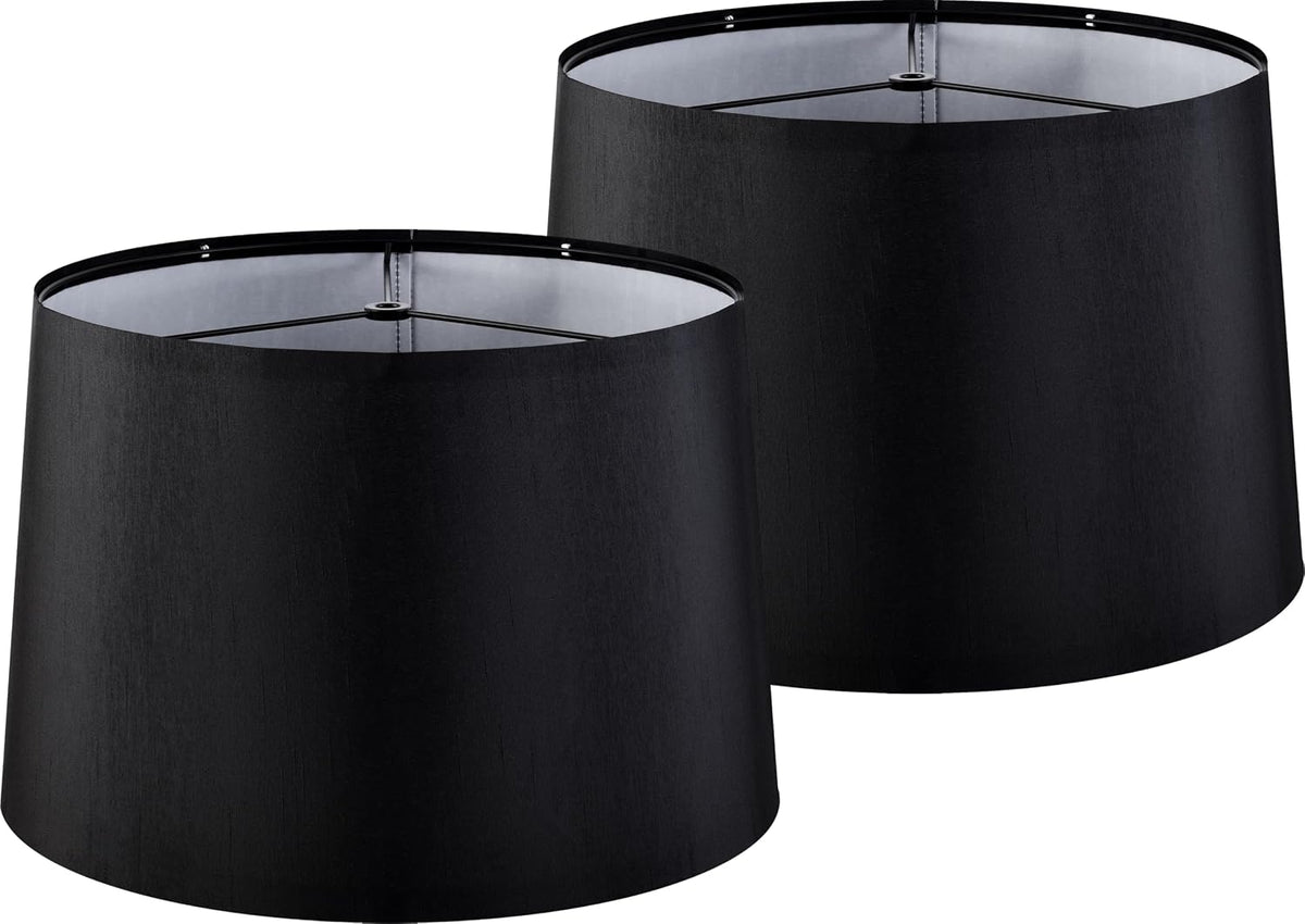 Set of two black drum lampshades with inner white lining and top spider fitter visible