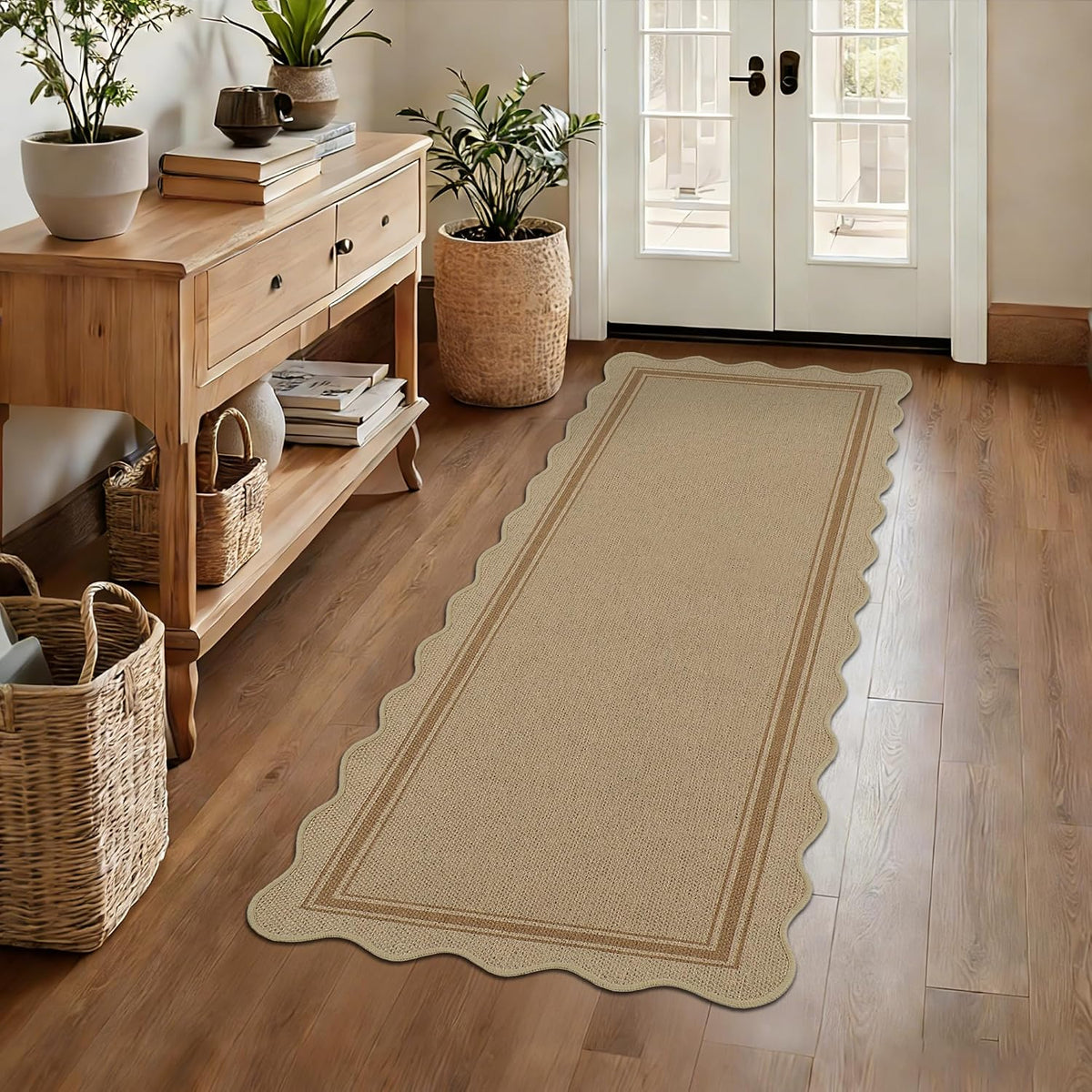 Long beige scalloped runner with twin border lines in an entryway beside a wooden console table and woven baskets