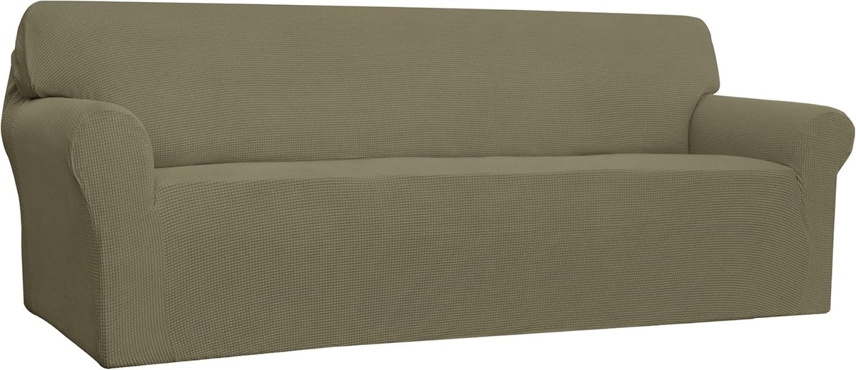 Left three-quarter angle of an olive-green loveseat cover highlighting textured weave over the backrest.