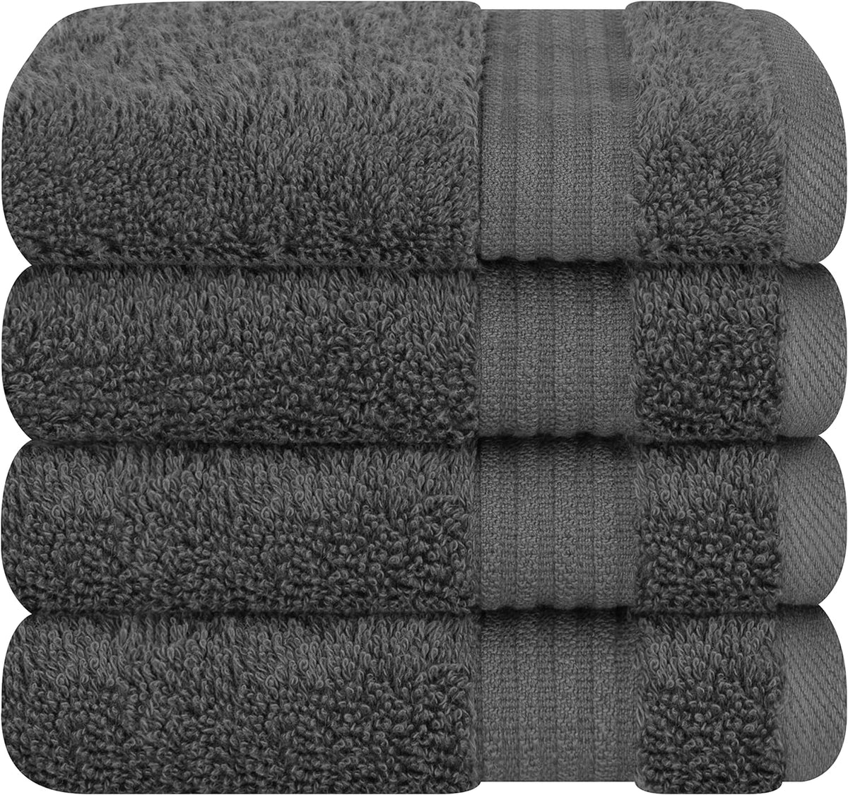 Close stacked view of four dark-gray terry towels showing textured loops and ribbed trim