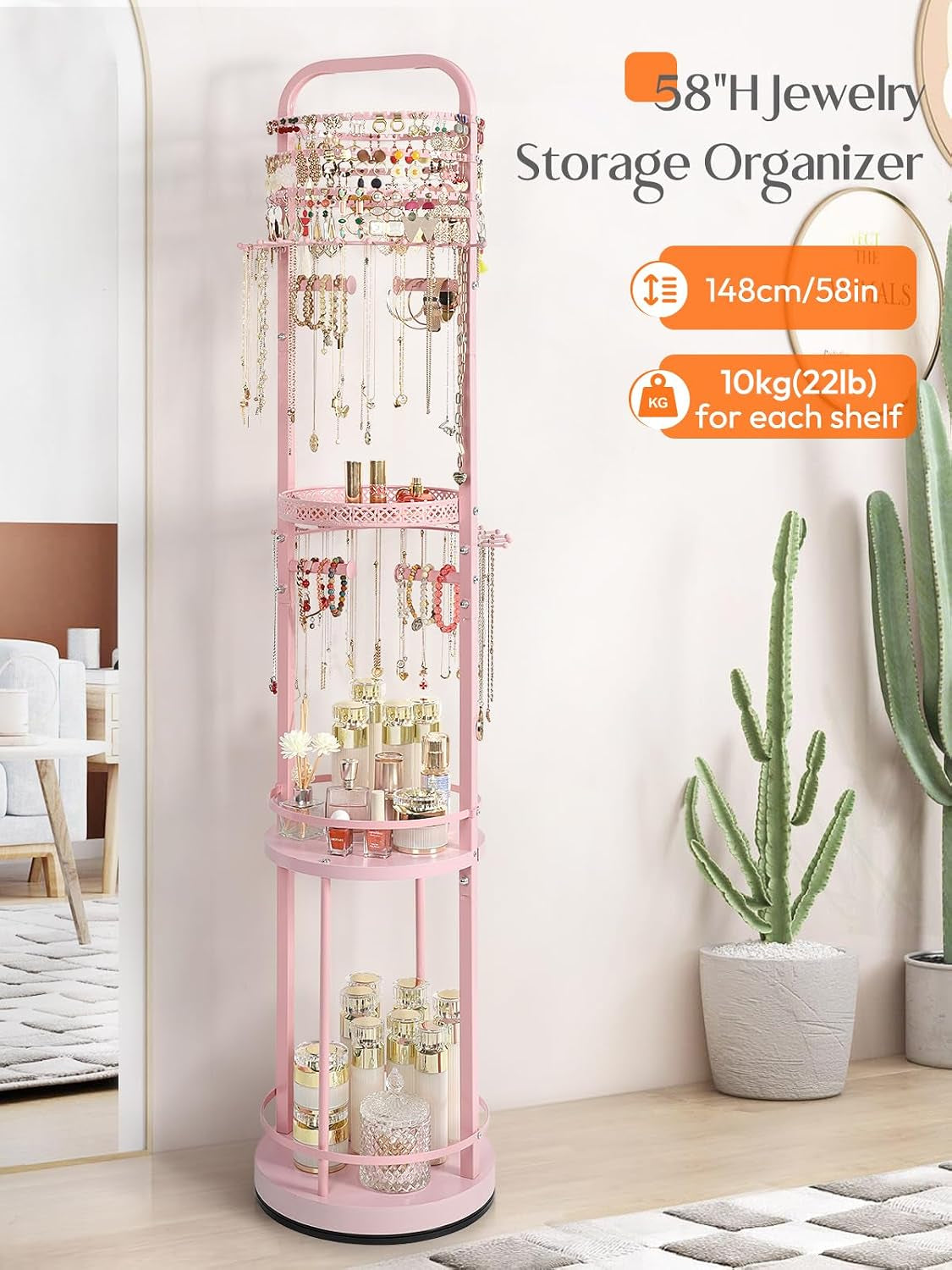Pink rotating organizer in a vanity setting with hanging necklaces and bottles on the lower shelf