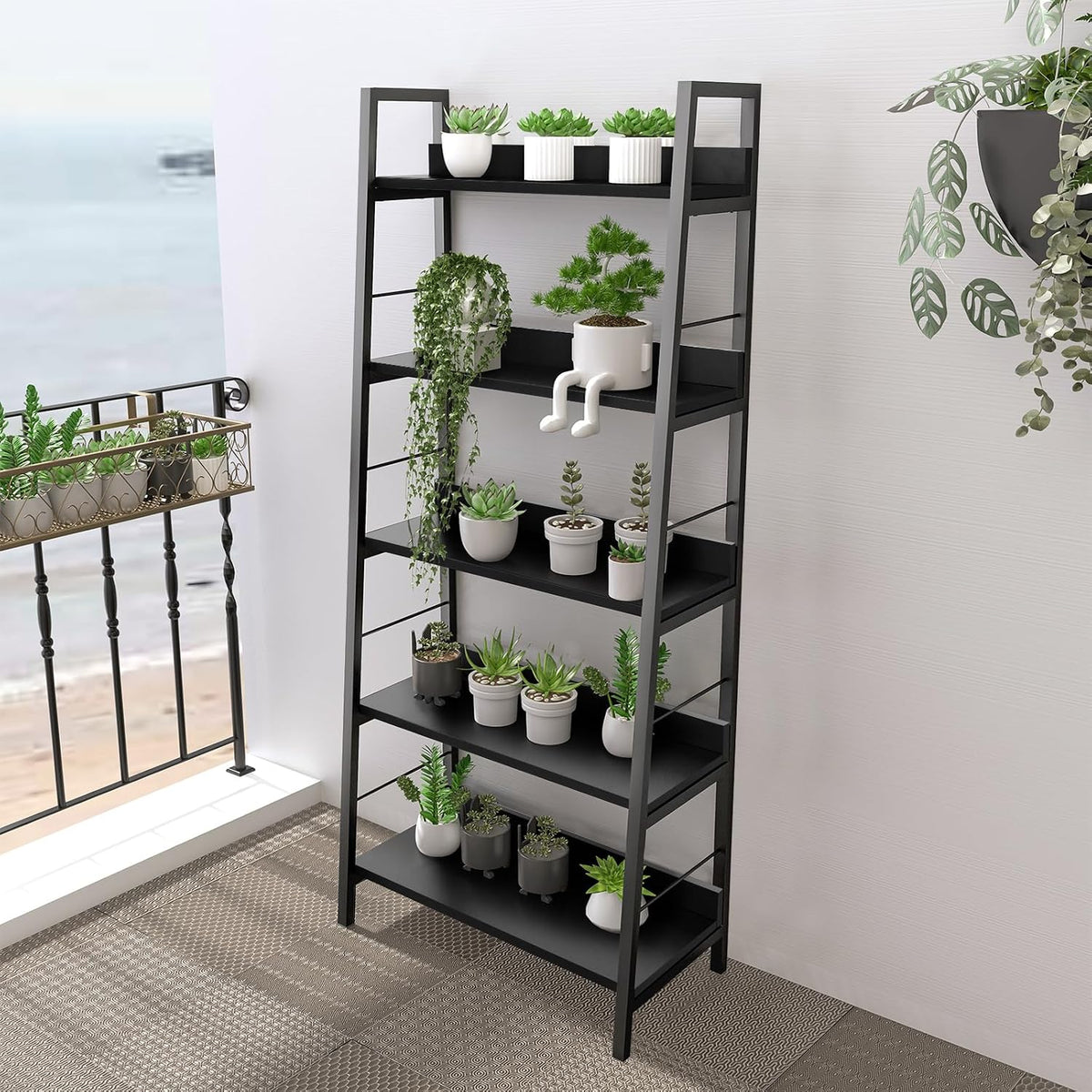 Black ladder bookshelf with multiple potted plants displayed across the shelves in a balcony setting