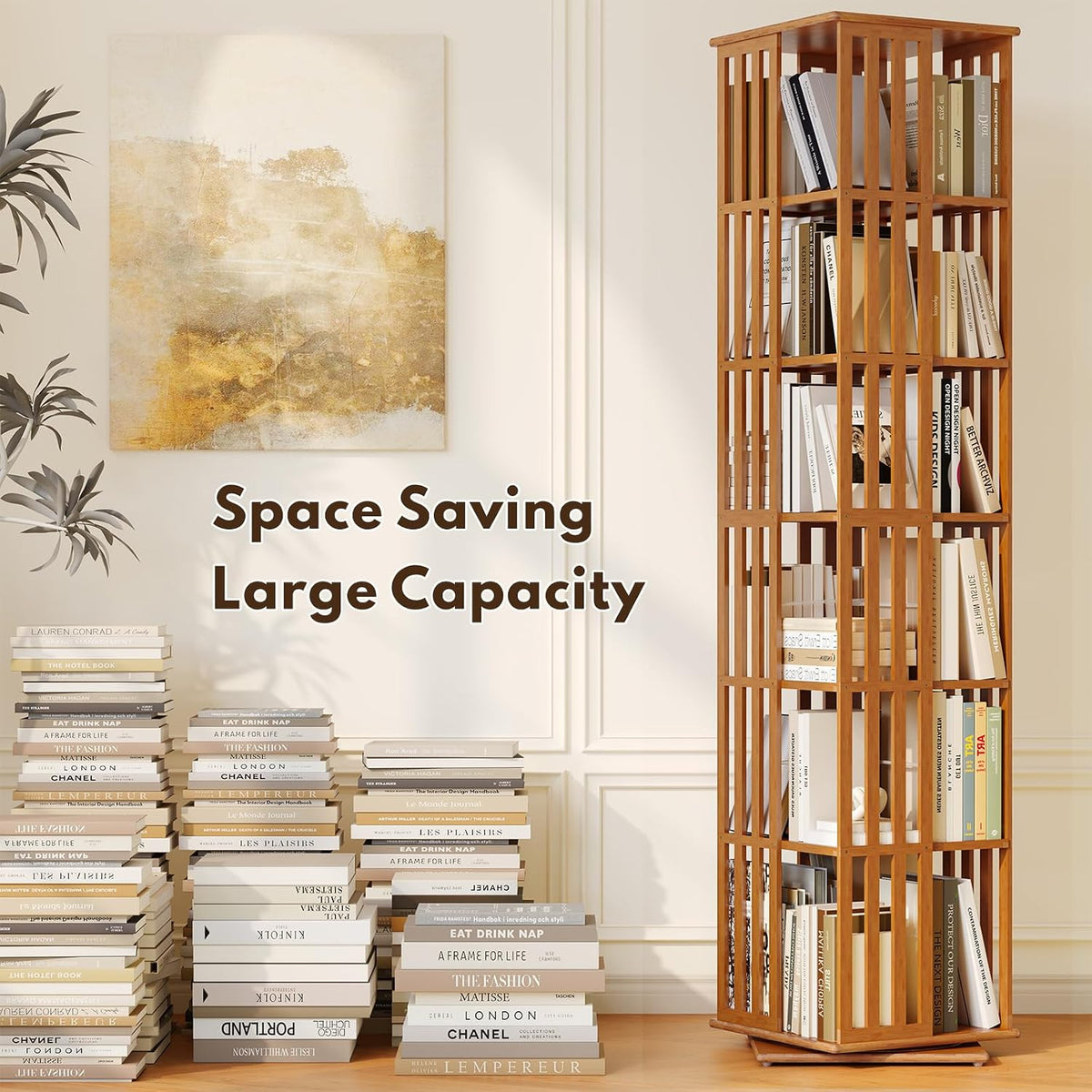Natural bamboo rotating bookshelf tower beside stacks of books and a desk, illustrating space saving